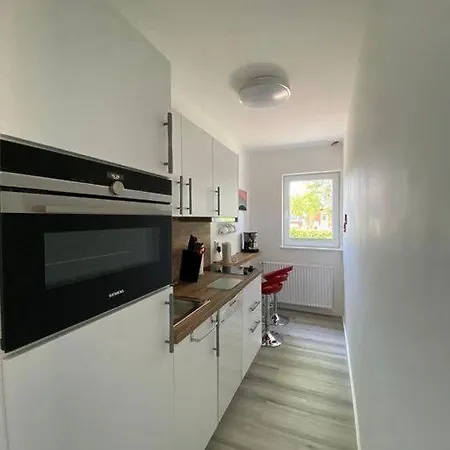 דירה Haus-seefalke-bungalow-achterdeck בורקום